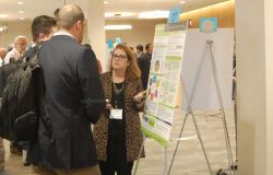 Interaction between a researcher and an industry representative.
