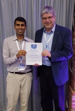 Uttam Thakore and Bill Sanders, as well as Gabe Weaver (not pictured), win the Best Paper Award at DSN 2016