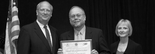 Roy Campbell receiving award