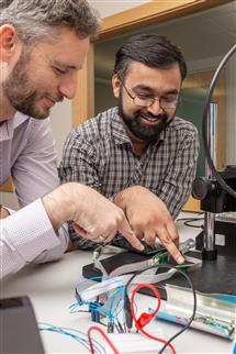 Researchers working on skimmers.